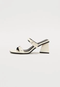 Heeled Mules - White